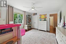 Second Bedroom with Hardwood Flooring -