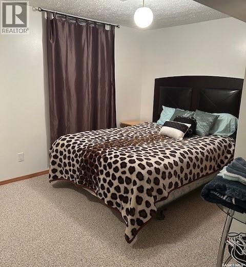 206 2Nd Street W, Carrot River, SK - Indoor Photo Showing Bedroom