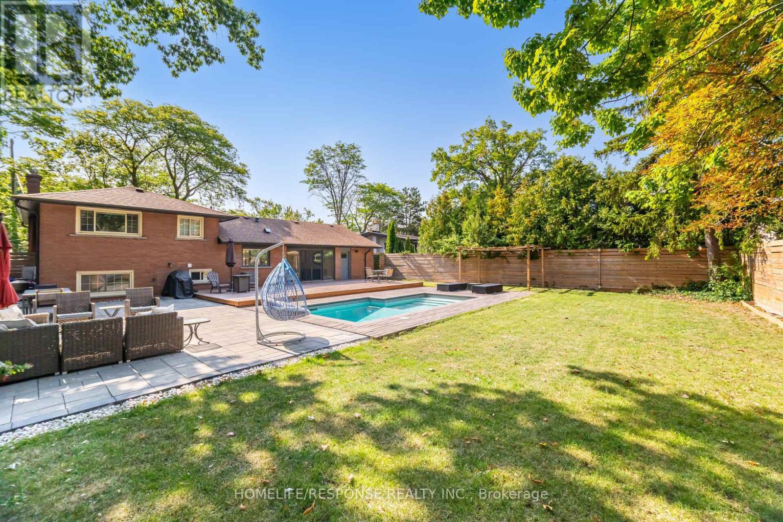 5011 Spruce Avenue, Burlington, ON - Outdoor With In Ground Pool With Deck Patio Veranda With Backyard