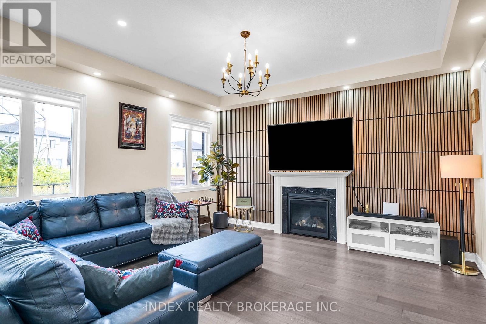 199 Granite Ridge Trail, Hamilton, ON - Indoor Photo Showing Living Room With Fireplace