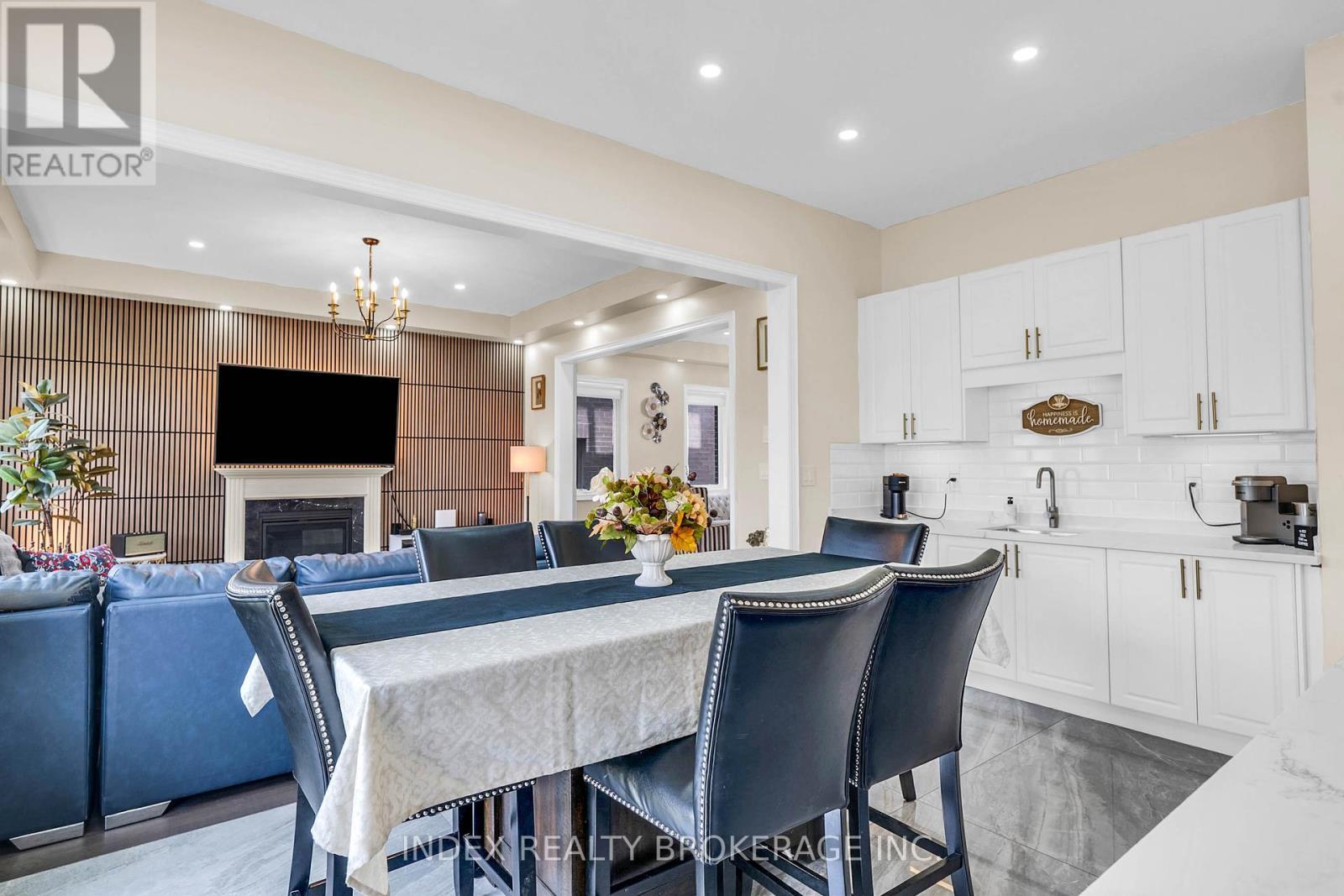 199 Granite Ridge Trail, Hamilton, ON - Indoor Photo Showing Dining Room With Fireplace