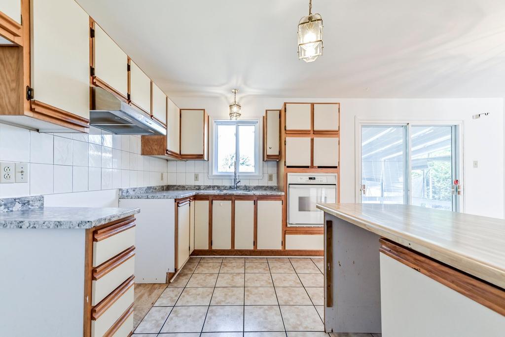 Cuisine - 5615 Av. Auteuil, Brossard, QC - Indoor Photo Showing Kitchen With Double Sink
