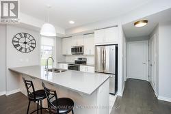 Quartz countertops and pot lights -