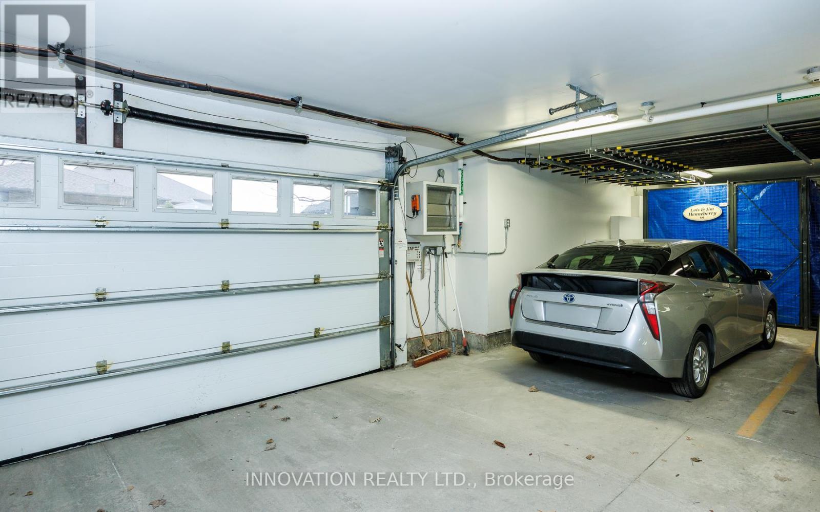 Heated underground parking - 103 - 320 Jatoba, Ottawa, ON - Indoor Photo Showing Garage