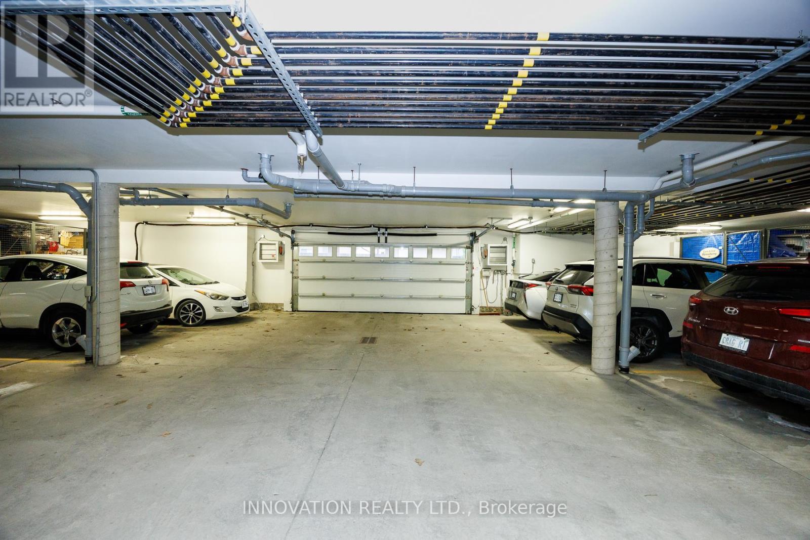 Heated storage units as well! - 103 - 320 Jatoba, Ottawa, ON - Indoor Photo Showing Garage