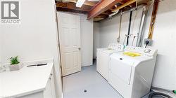 Washroom with separate washer and dryer -