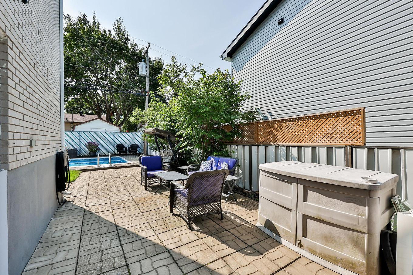 Backyard - 1008 Rue Violette, Laval (Sainte-Dorothée), QC - Outdoor With Exterior