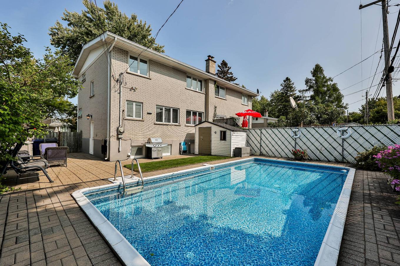 Pool - 1008 Rue Violette, Laval (Sainte-Dorothée), QC - Outdoor With In Ground Pool