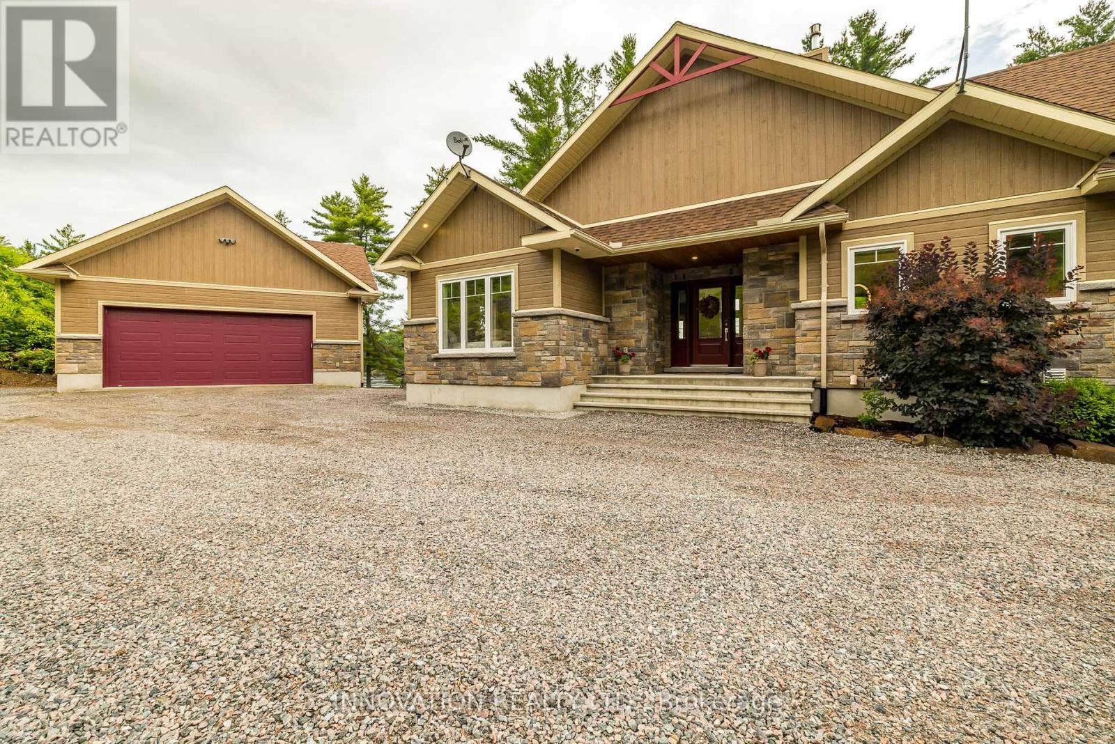 103 A Carriage Landing Drive, Horton, ON - Outdoor With Facade