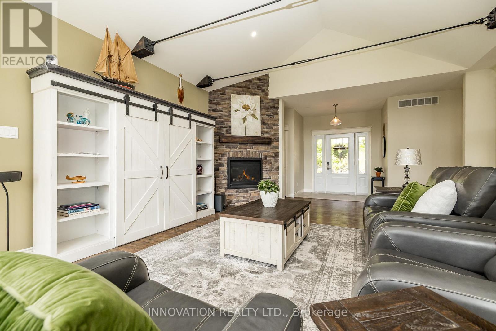 103 A Carriage Landing Drive, Horton, ON - Indoor Photo Showing Living Room With Fireplace
