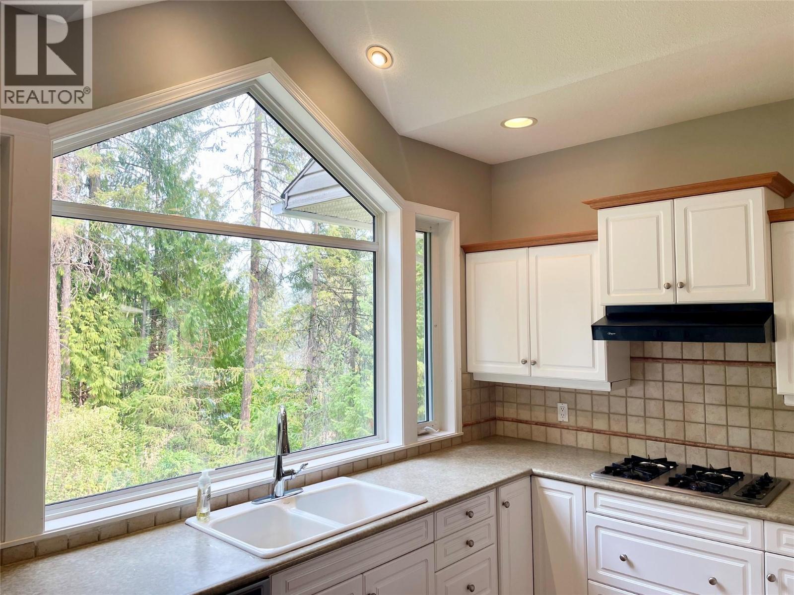253 Chase Road, Christina Lake, BC - Indoor Photo Showing Kitchen With Double Sink