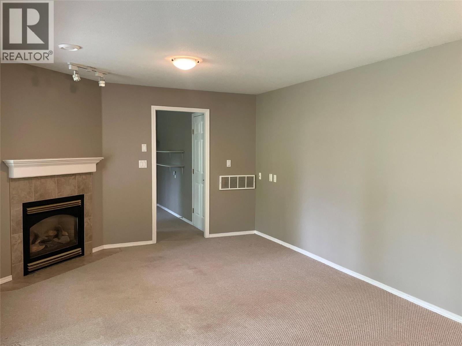 253 Chase Road, Christina Lake, BC - Indoor With Fireplace