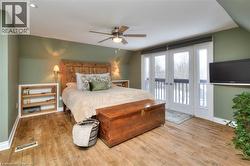 primary bedroom with beautiful views to the back of the property. -