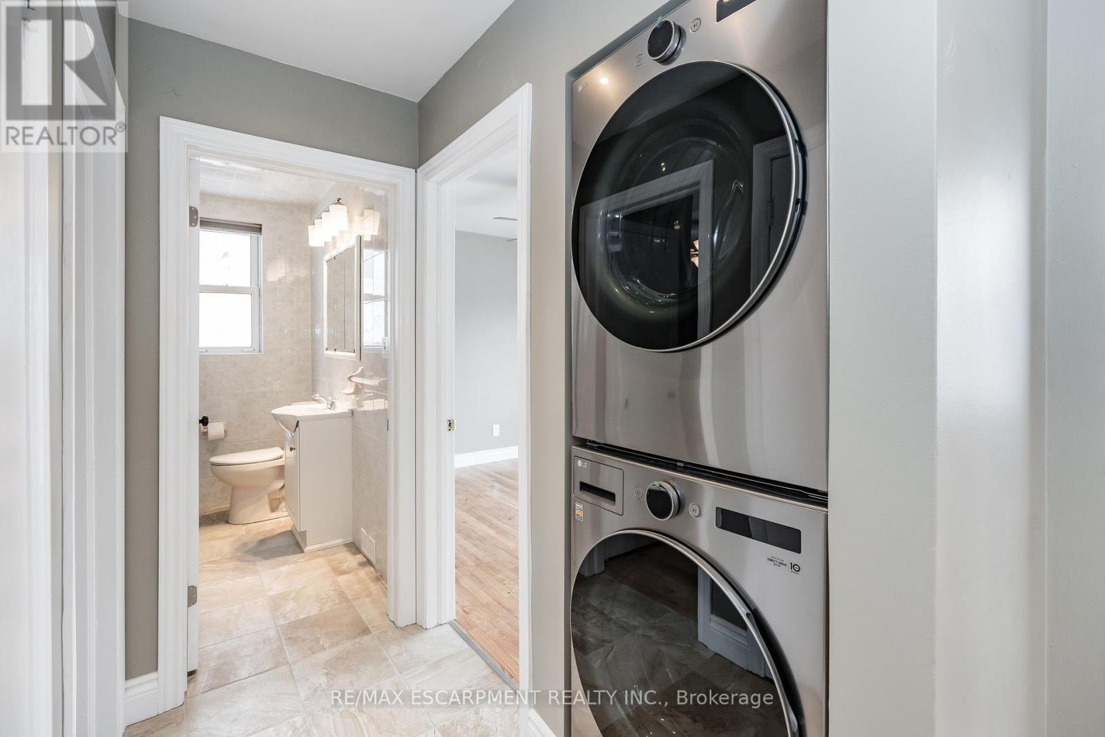 In-Suite Laundry - (Upper) - 317 King Street E, Hamilton, ON - Indoor Photo Showing Laundry Room