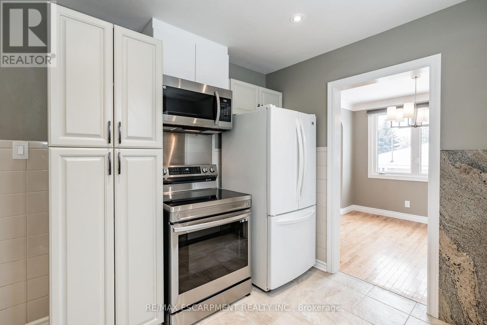 Newer Appliances - (Upper) - 317 King Street E, Hamilton, ON - Indoor Photo Showing Kitchen