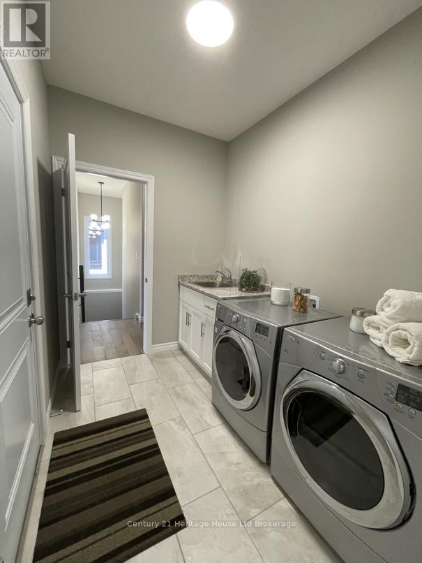 22 Matheson Crescent, East Zorra-Tavistock (Innerkip), ON - Indoor Photo Showing Laundry Room