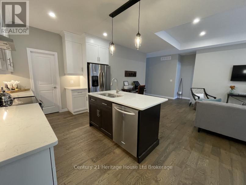 22 Matheson Crescent, East Zorra-Tavistock (Innerkip), ON - Indoor Photo Showing Kitchen With Double Sink With Upgraded Kitchen