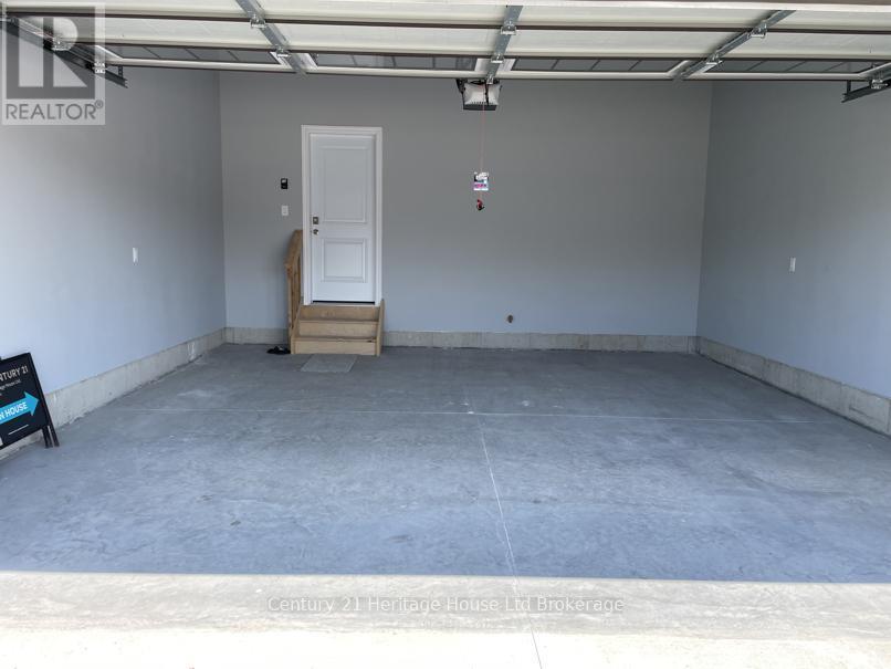 22 Matheson Crescent, East Zorra-Tavistock (Innerkip), ON - Indoor Photo Showing Garage