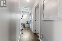 Hall with launy and doors to deck/clothes line -