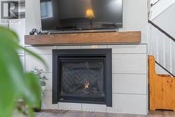 Lower level family room w gas fireplace -