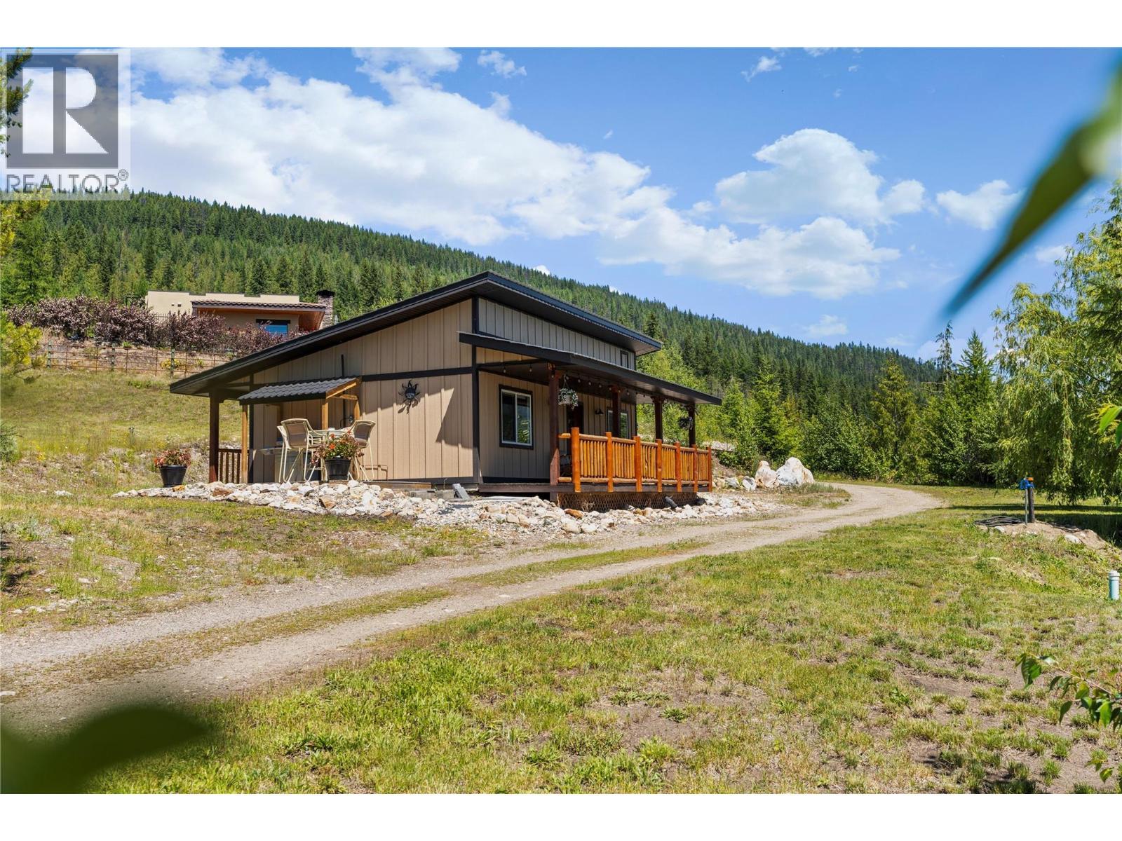 Equestrian Cabin with living quarters - 1309 Eagle Ridge Road, Lumby, BC - Outdoor With Deck Patio Veranda
