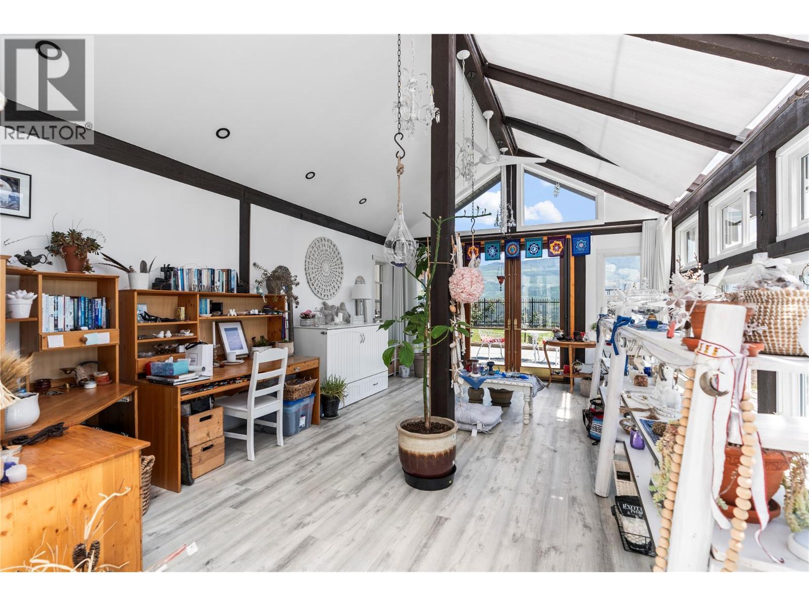 Greenhouse studio has in slab heating from propane - 1309 Eagle Ridge Road, Lumby, BC - Indoor Photo Showing Other Room