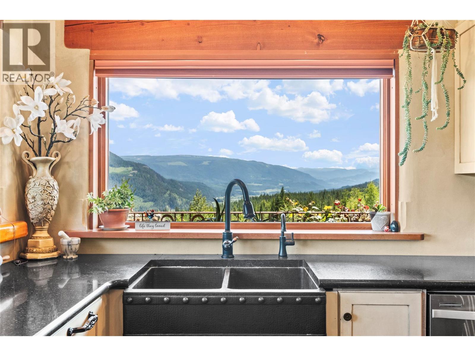 Stunning views - 1309 Eagle Ridge Road, Lumby, BC - Indoor Photo Showing Kitchen With Double Sink