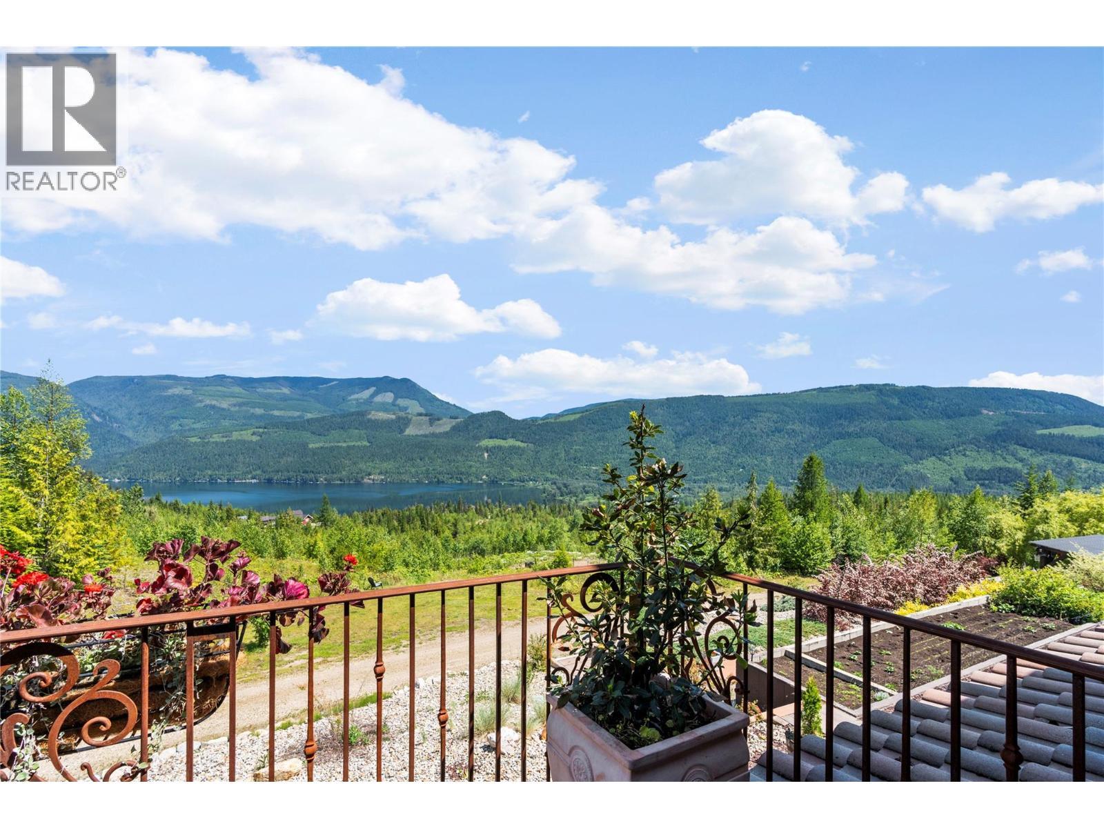 Views from the upper deck - 1309 Eagle Ridge Road, Lumby, BC - Outdoor With Body Of Water With View