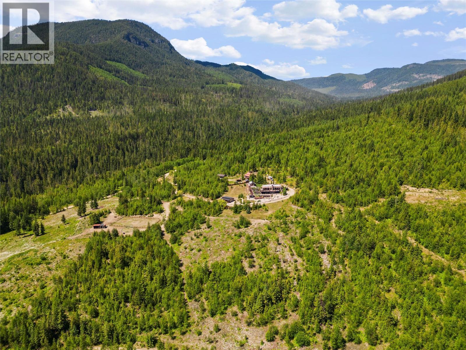 Aerial view back towards the property - 1309 Eagle Ridge Road, Lumby, BC - Outdoor With View