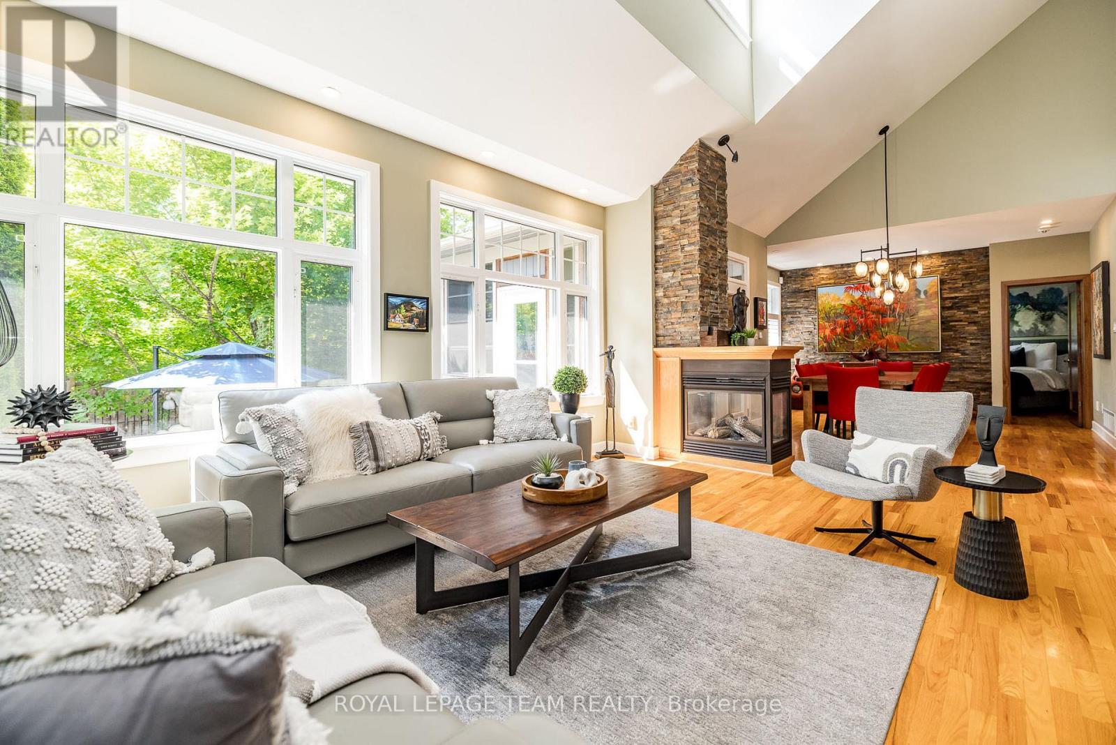 19 Turtle Point Private, Ottawa, ON - Indoor Photo Showing Living Room With Fireplace