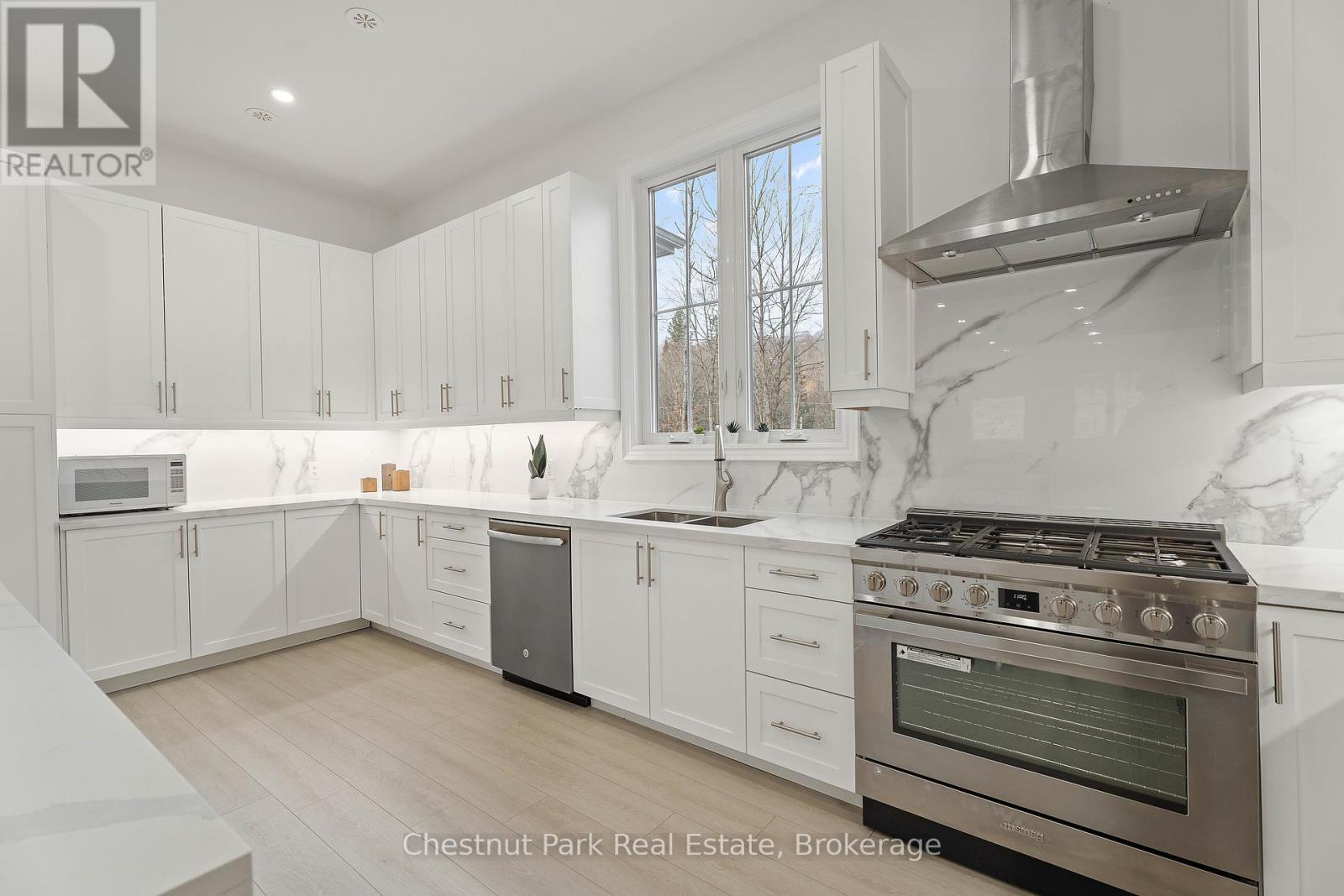 1153 Deer Lake Road, Perry (Emsdale), ON - Indoor Photo Showing Kitchen With Double Sink