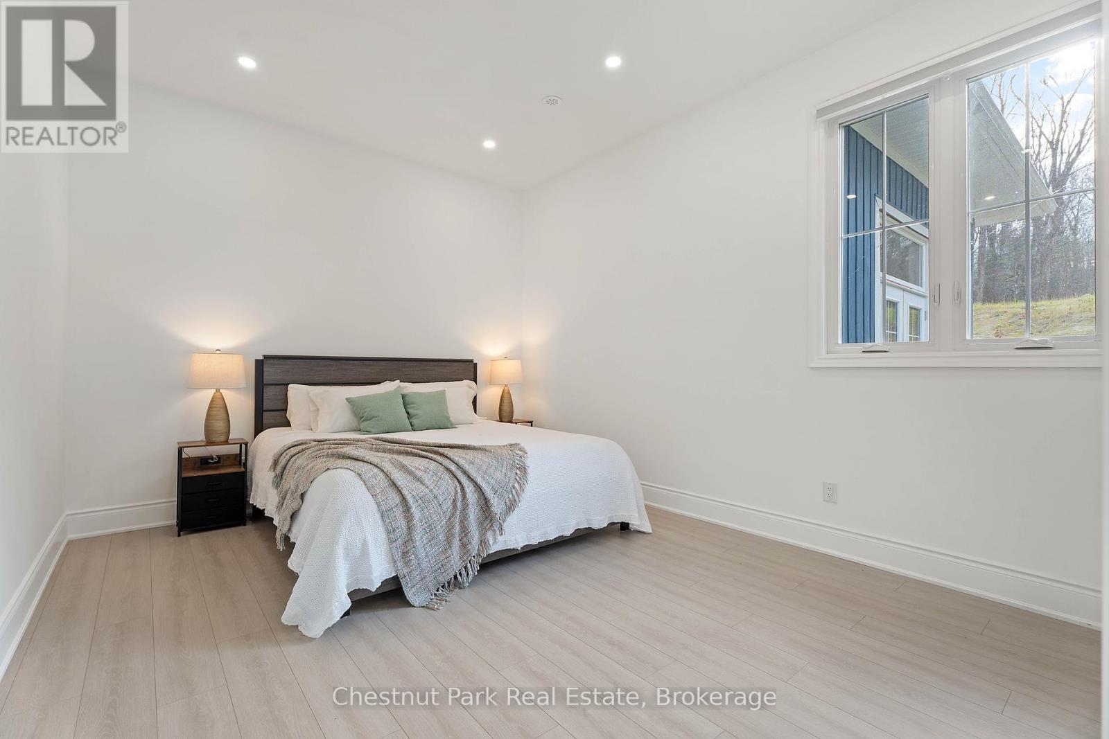 1153 Deer Lake Road, Perry (Emsdale), ON - Indoor Photo Showing Bedroom