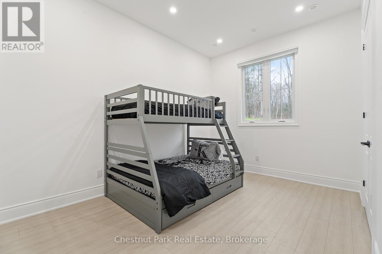 1153 Deer Lake Road, Perry (Emsdale), ON - Indoor Photo Showing Bedroom
