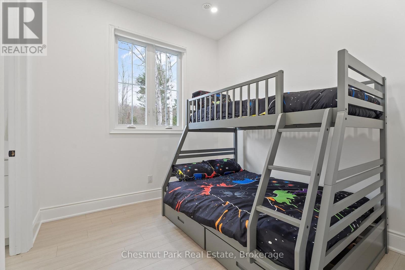 1153 Deer Lake Road, Perry (Emsdale), ON - Indoor Photo Showing Bedroom