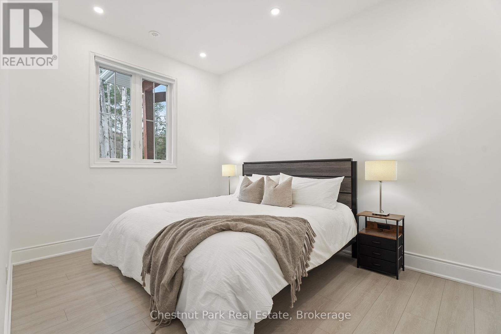1153 Deer Lake Road, Perry (Emsdale), ON - Indoor Photo Showing Bedroom