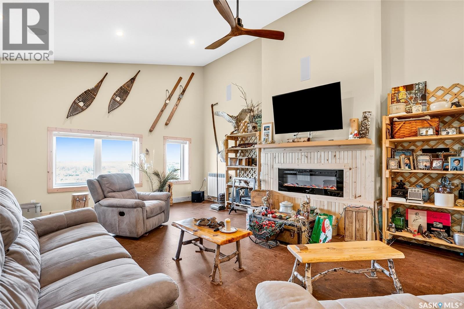 322 Laurier Crescent, Laird Rm No. 404, SK - Indoor Photo Showing Living Room With Fireplace