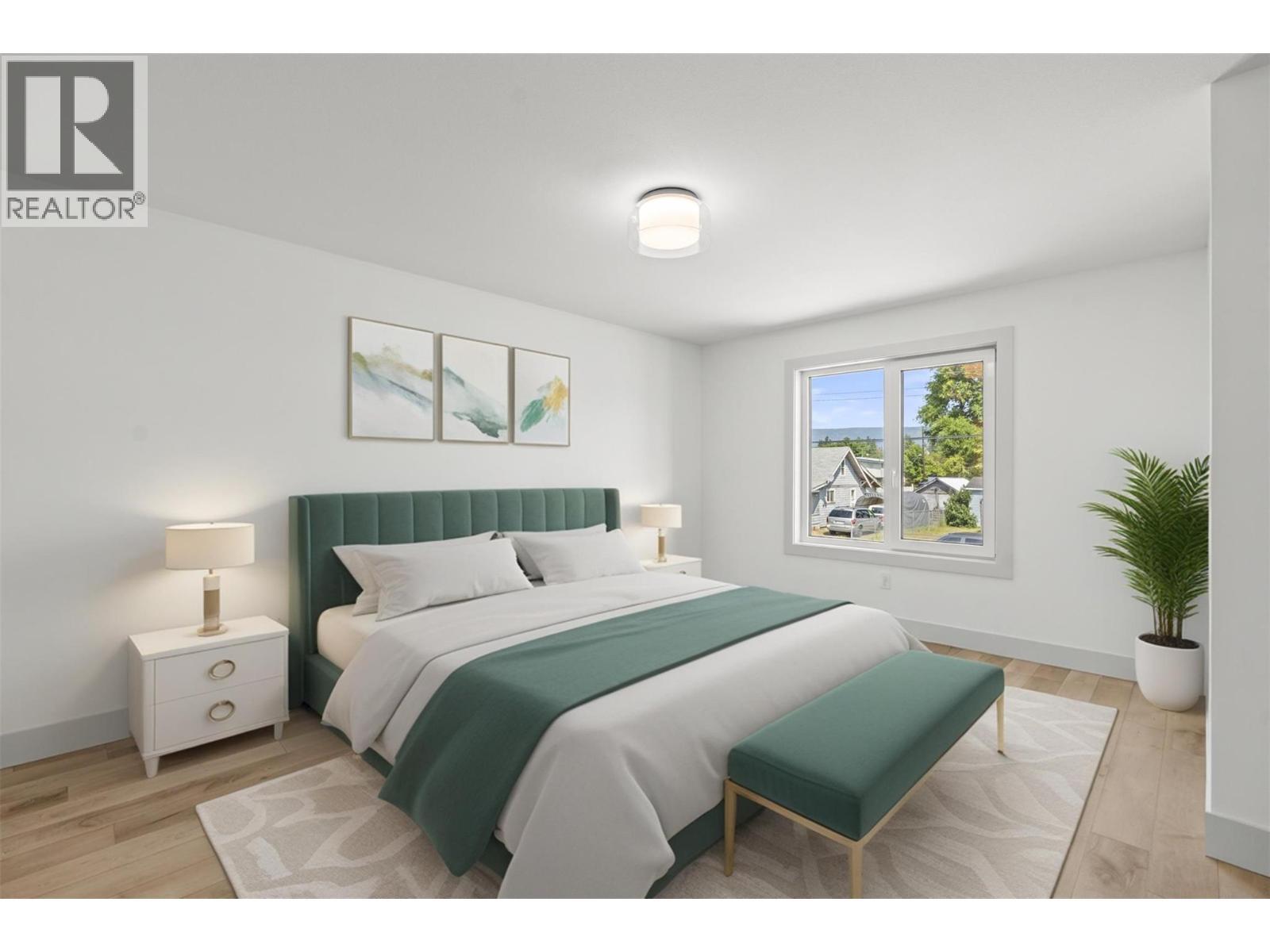 Primary bedroom is virtually staged - 2345 Patterson Avenue Unit# 101, Armstrong, BC - Indoor Photo Showing Bedroom