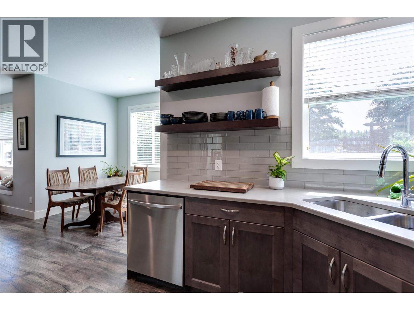 1257 And 1259 Rio Drive, Kelowna, BC - Indoor Photo Showing Kitchen With Double Sink