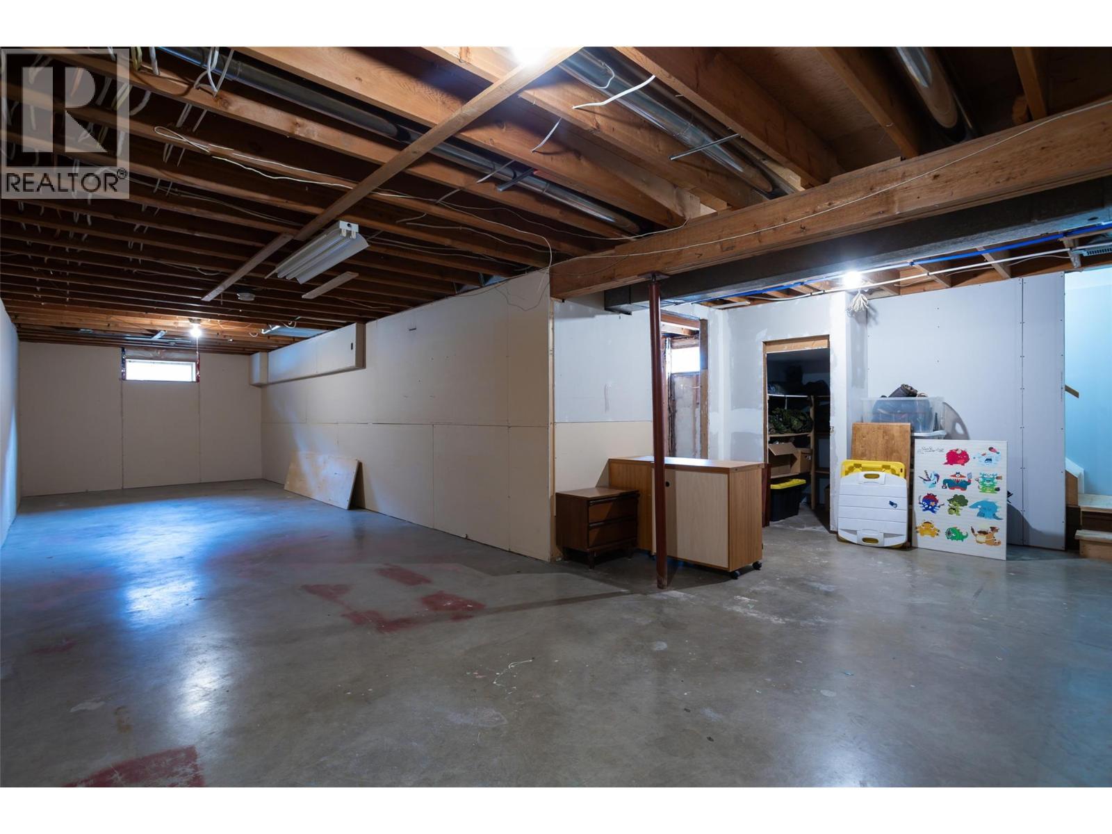 1257 And 1259 Rio Drive, Kelowna, BC - Indoor Photo Showing Basement