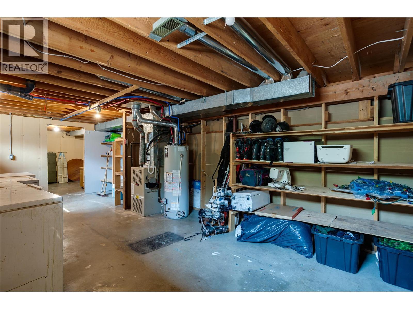 1257 And 1259 Rio Drive, Kelowna, BC - Indoor Photo Showing Basement