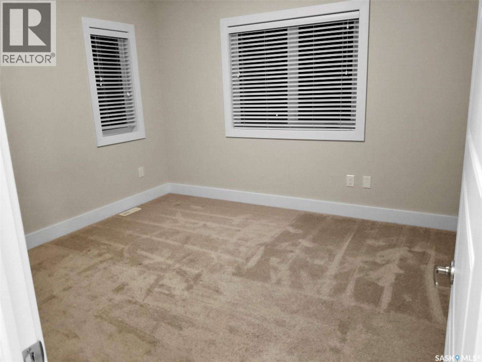 1-4 316 3Rd Street W, Delisle, SK - Indoor Photo Showing Other Room