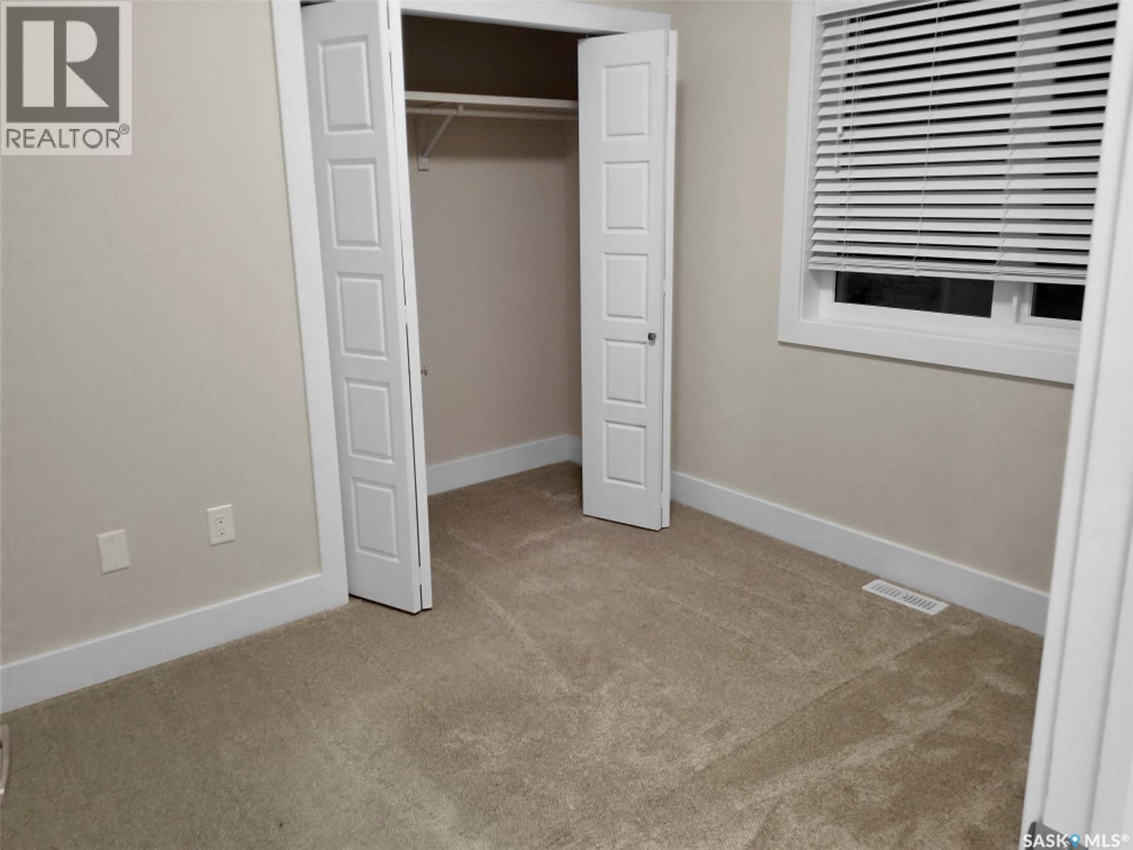 1-4 316 3Rd Street W, Delisle, SK - Indoor Photo Showing Other Room