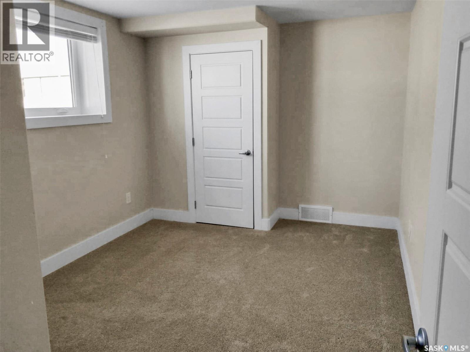 1-4 316 3Rd Street W, Delisle, SK - Indoor Photo Showing Other Room