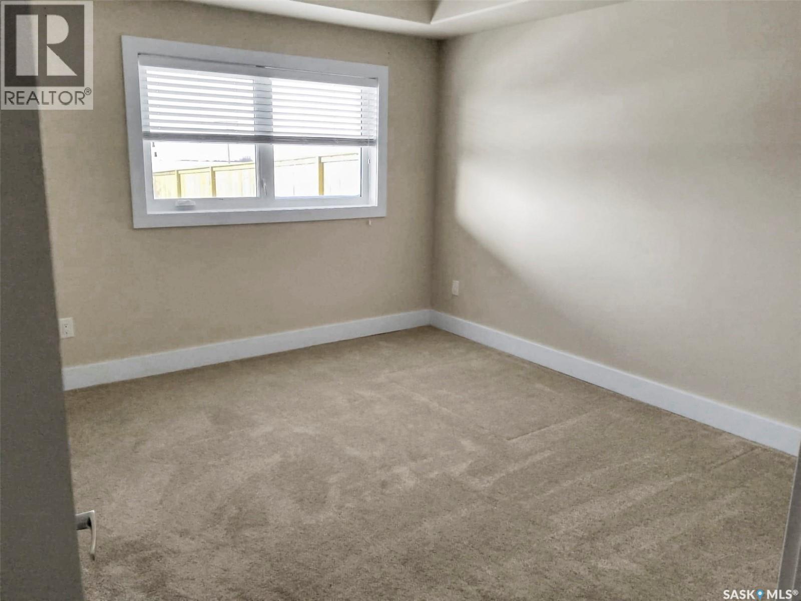 1-4 316 3Rd Street W, Delisle, SK - Indoor Photo Showing Other Room