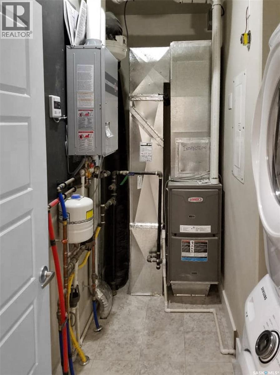 1-4 316 3Rd Street W, Delisle, SK - Indoor Photo Showing Laundry Room