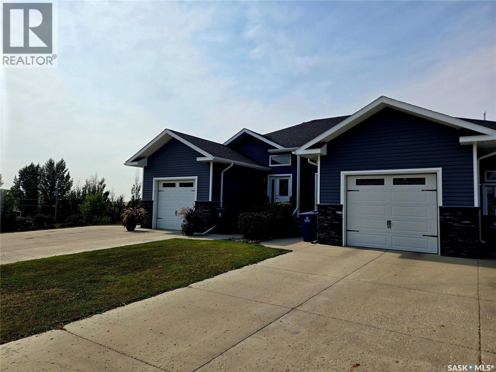 1-4 316 3Rd Street W, Delisle, SK - Outdoor With Facade