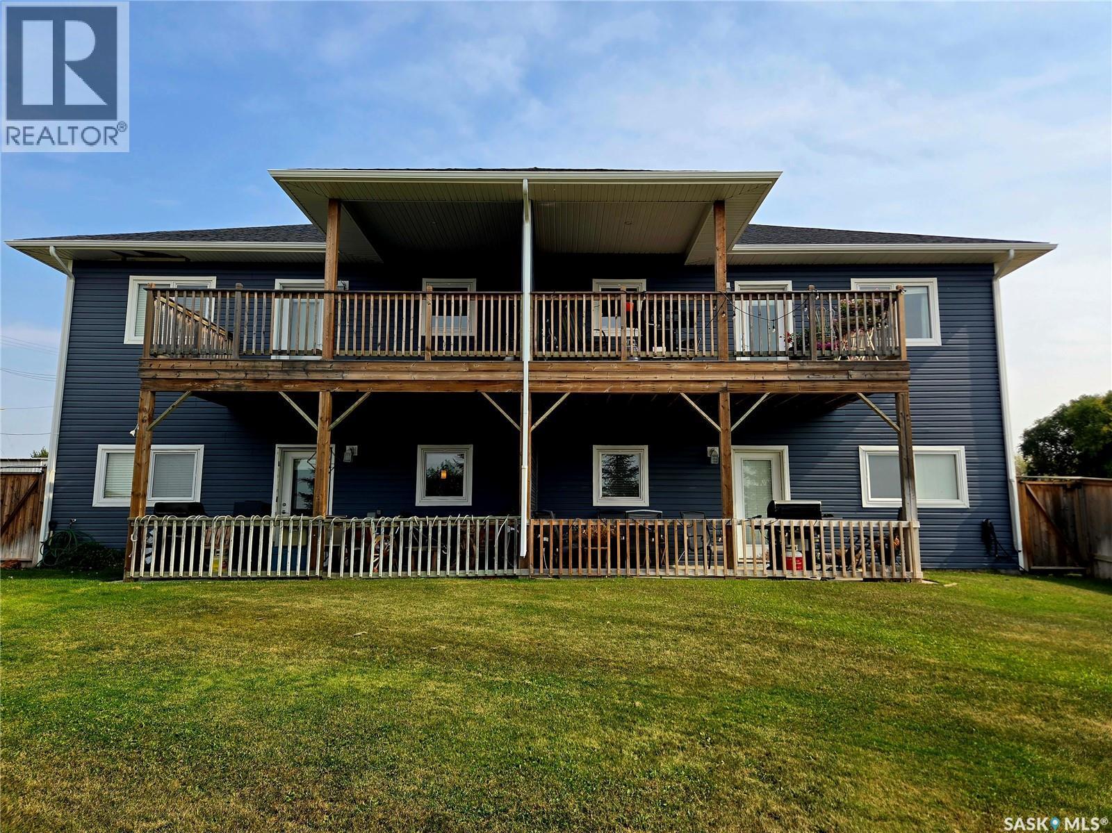 1-4 316 3Rd Street W, Delisle, SK - Outdoor With Balcony