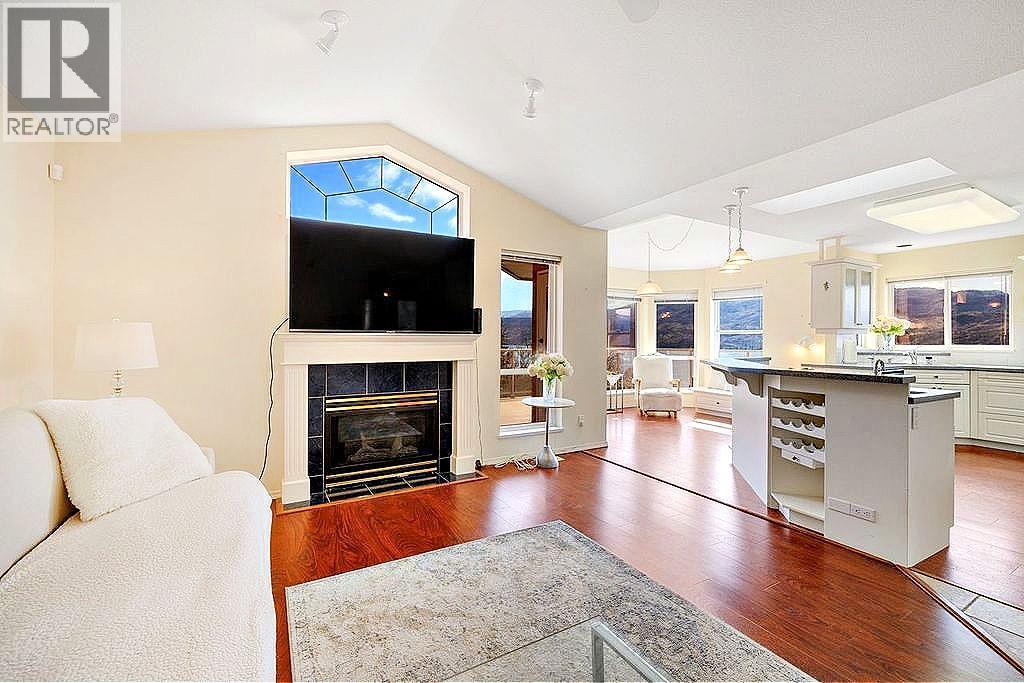 5205 Macneill Court, Peachland, BC - Indoor Photo Showing Living Room With Fireplace
