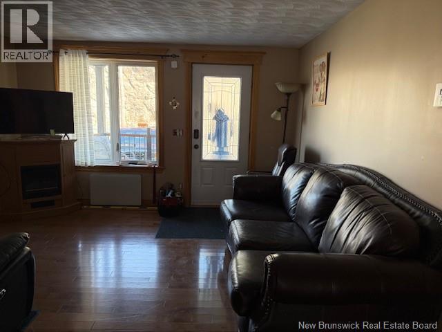 6 Lebel Court, Campbellton, NB - Indoor Photo Showing Living Room With Fireplace