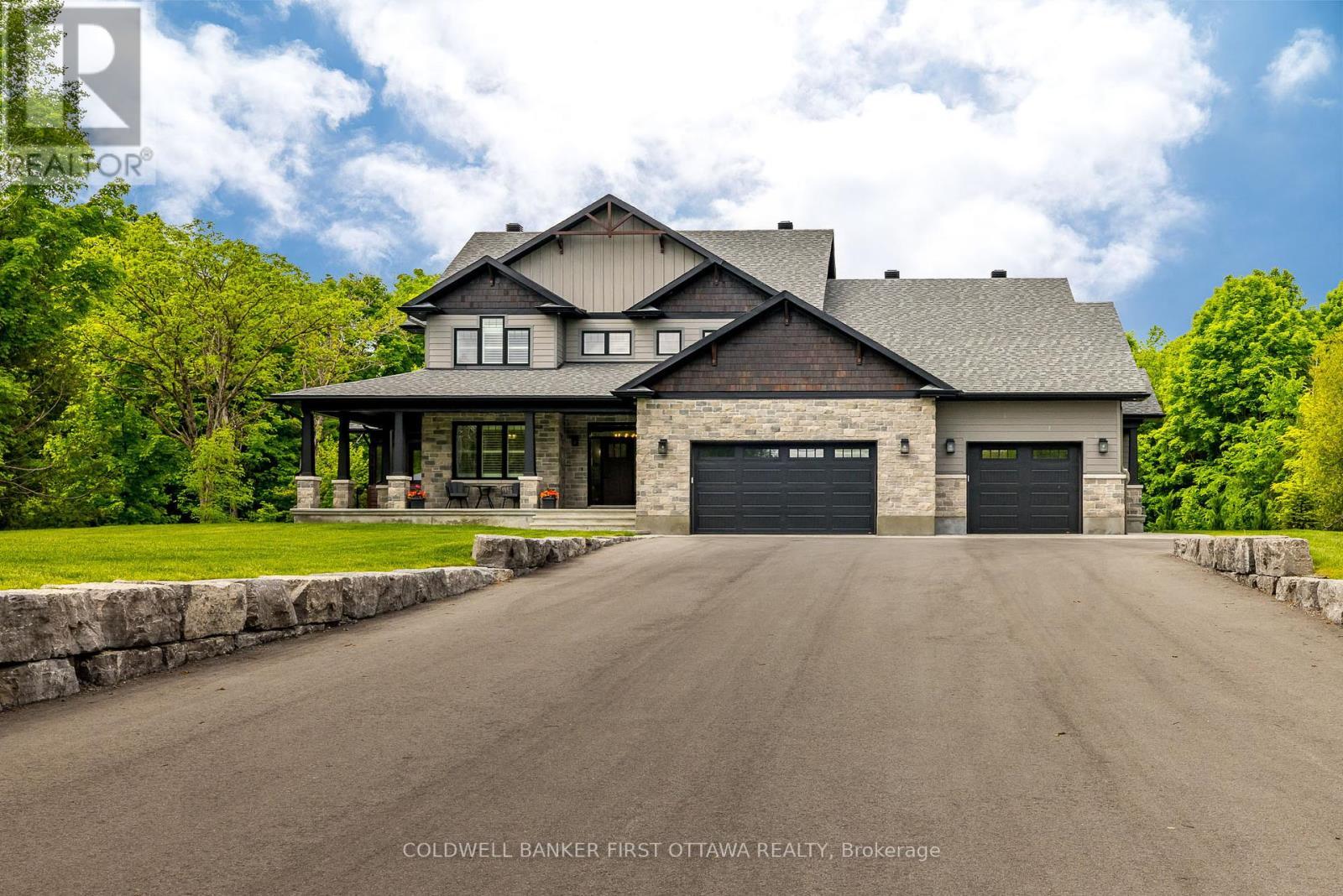 Insulated 3 car garage, irrigation installed - 481 Sangeet Place, Ottawa, ON - Outdoor With Deck Patio Veranda With Facade